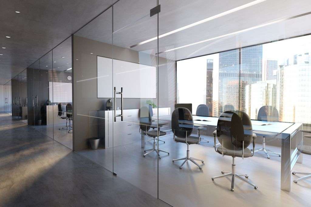 Modern office glass partition with frameless glass door hardware and floor-to-ceiling windows
